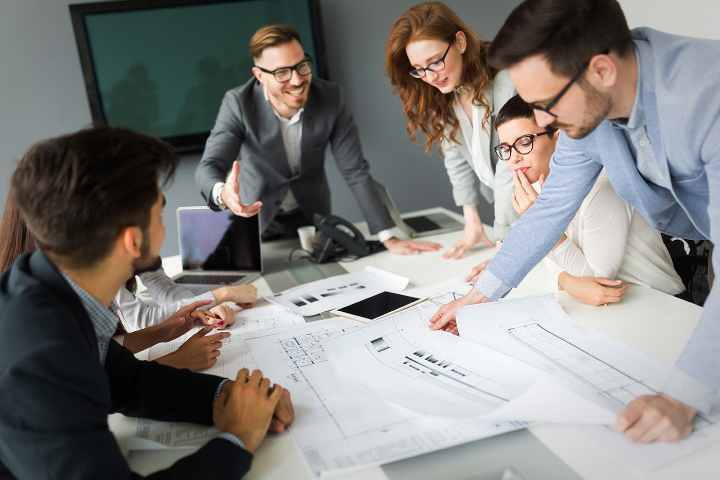 group-of-architects-working-on-project-PQWE4JL